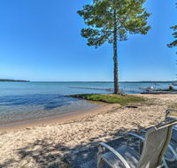 Modern Torch Lake Cottage with Dock and Fire Pit